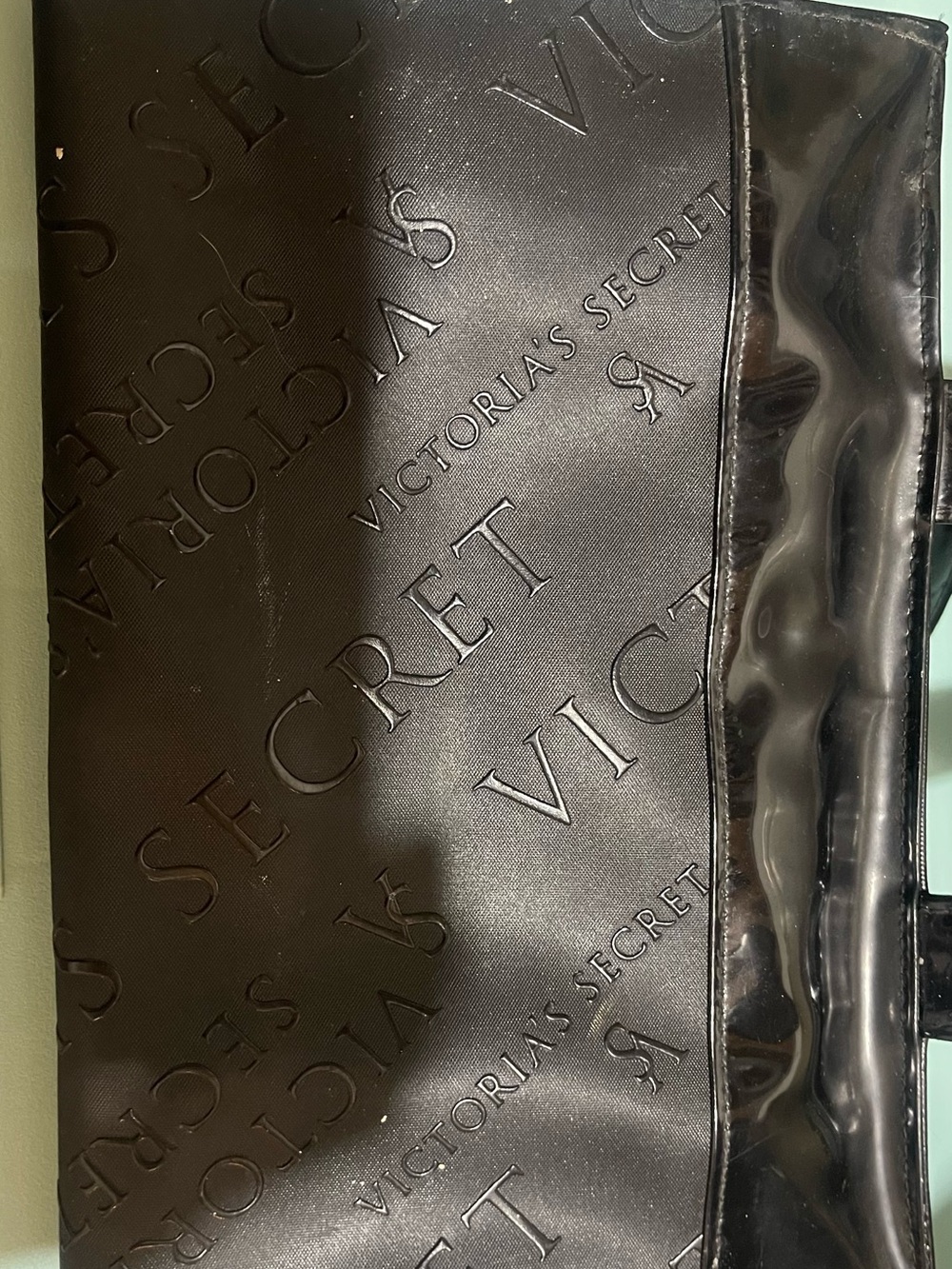 Victoria's Secret Black Embossed Logo makeup or accessory